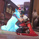 An Overwatch character hugs her dog.